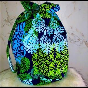 Dry bag. Great with summer coming, put your wet bathing suit in it ! Lined